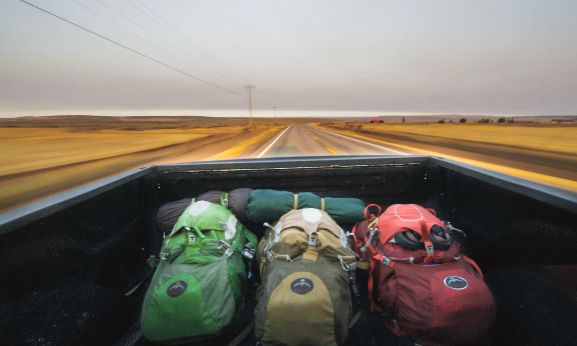 backpacks in pickup truck